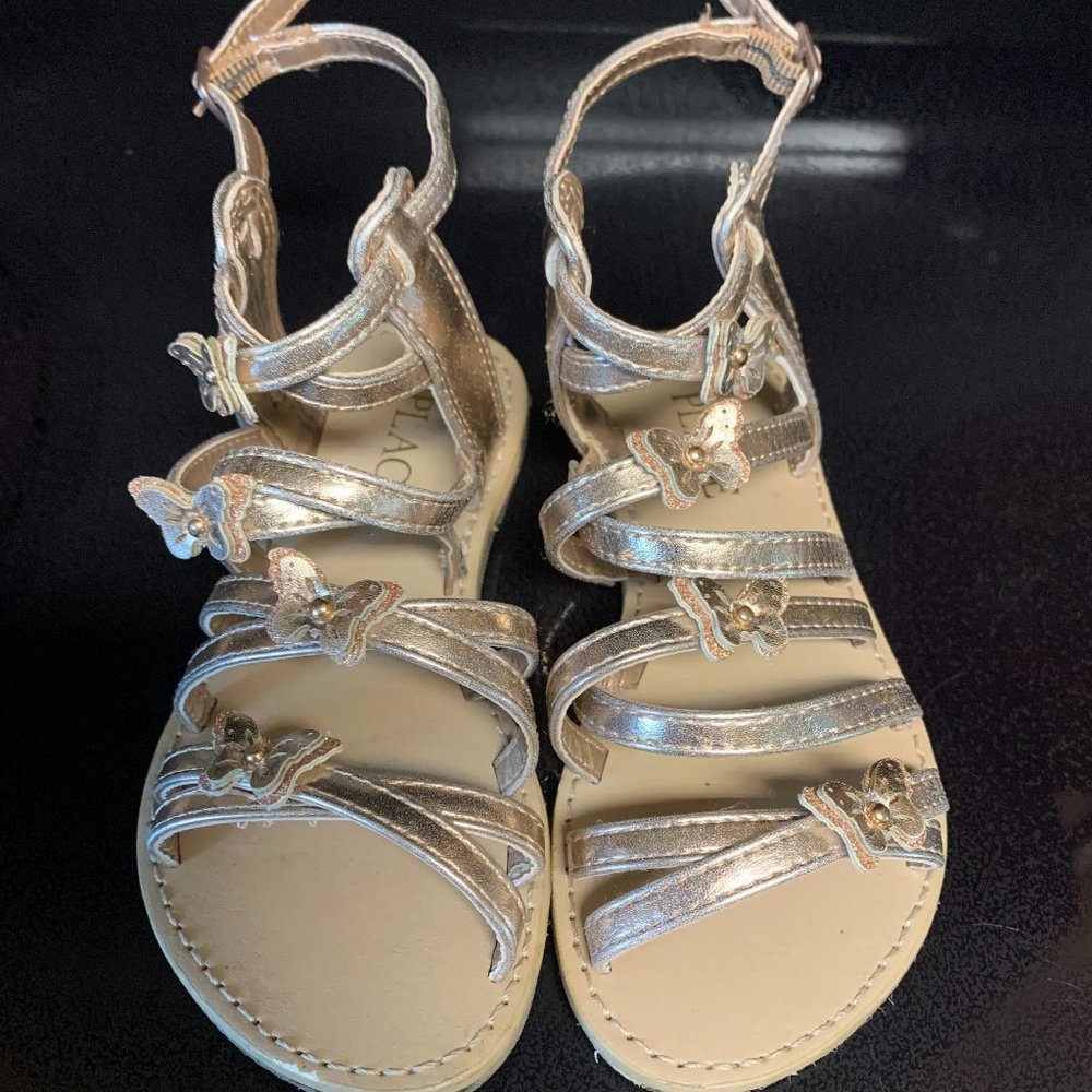 Place Gladiator gold butterfly sandal 11